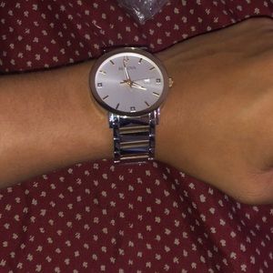 Selling watch with minor scratches.